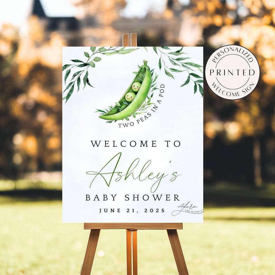 Two Peas in a Pod Baby Shower Welcome Sign with two baby peas inside a watercolor pea pod, surrounded by greenery and florals, perfect for a twin-themed celebration.