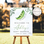 Two Peas in a Pod Baby Shower Welcome Sign with two baby peas inside a watercolor pea pod, surrounded by greenery and florals, perfect for a twin-themed celebration.