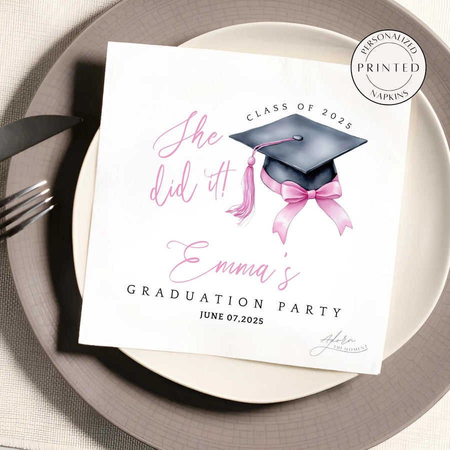 Personalized pink bow graduation napkins with black graduation cap, pink tassel, and custom name, class year, and event date – elegant coquette-style party decor. Available in Luncheon and Cocktail sizes