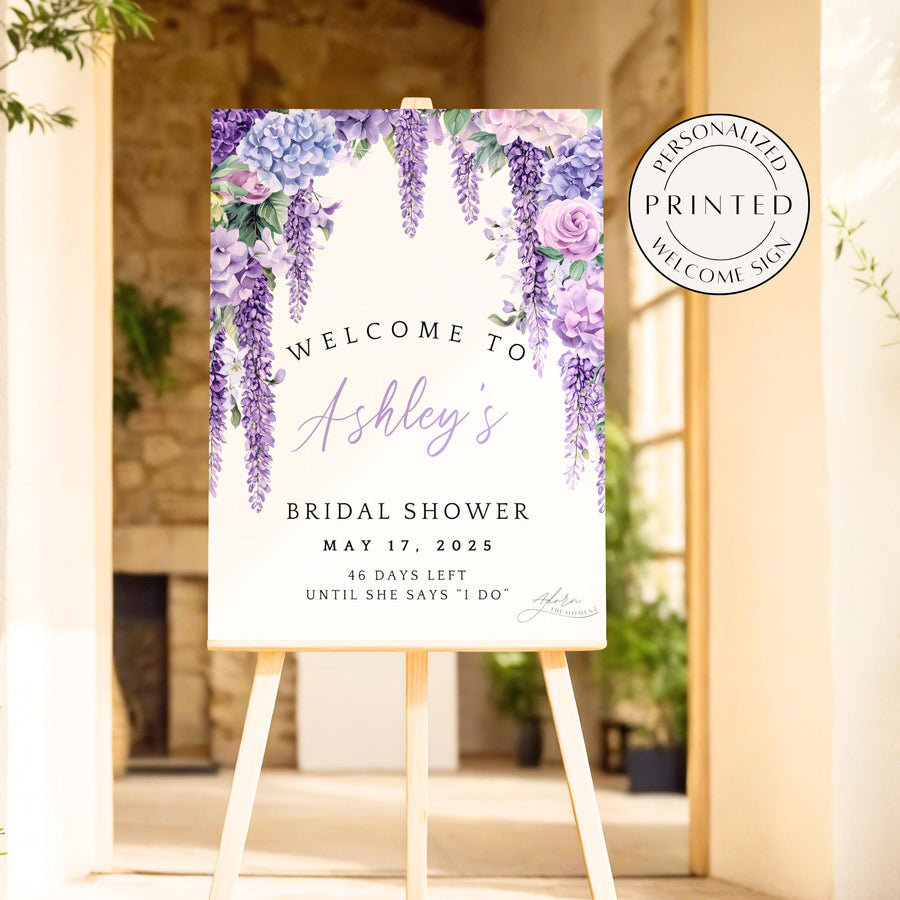 Purple floral bridal shower welcome sign with hydrangeas, wisteria, peonies, and roses

Watercolor purple flower bridal shower sign with custom name and date

Elegant purple floral wedding countdown sign for bridal shower decor

Personalized welcome sign with soft watercolor purple flowers for bridal shower